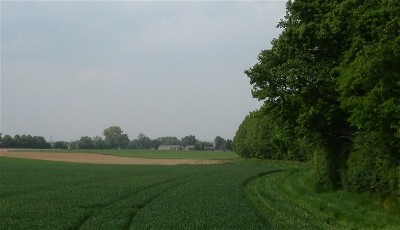 De Geverdelle oftewel Onger de Hoosterberg vanuit het gezicht naar Catsop. Links loopt de Eykskensweg. In het midden naar Catsop  boerderij Cremers  aan de Geversdelleweg.